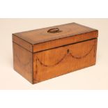 A GEORGIAN SATINWOOD TEA CHEST, c.1800, of oblong form with ebony edge stringing and inlaid with