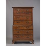 A GEORGIAN MAHOGANY CHEST ON CHEST, third quarter 18th century, the dentil moulded cavetto cornice