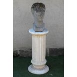 A COMPOSITION STONE MALE BUST after the antique, 19" high, on associated white composition fluted
