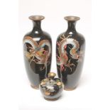 A PAIR OF JAPANESE CLOISONNE ENAMEL VASES of rounded flared cylindrical form, inlaid in colours with
