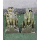 TWO GARGOYLE FIGURES each on oblong base, approximately 12" x 24" (Est. plus 21% premium inc. VAT)