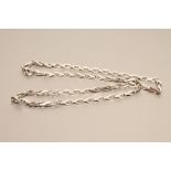 A 9CT WHITE GOLD "NEEDLELINK" CHAIN, London hallmark, sponsor's mark ADJ, 18" long, 21g (Est. plus