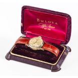 A "DOCTOR'S" BULOVA WRISTWATCH, the champagne dial with applied gilt metal Arabic numerals enclosing