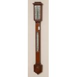 AN OAK CASED STICK BAROMETER by C. Baker, High Holborn, London, with ivory registers and