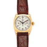 AN HEUER CHRONOGRAPH, 1949, the silvered dial with Arabic numerals and twin dials, mono-pusher,