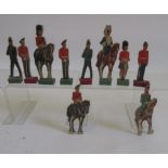 Ten cut out plywood regimental military figures (four mounted), on separate wood stands, 3 3/4" to 4