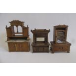 Three mid 20th century dolls' house wood dressers, one with marble top, 5 1/2" to 7 1/2" (Est.