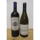 One bottle 2009 Chateau La Conseillante Pomerol and one bottle 2015 Puligny-Montrachet Les Champs-