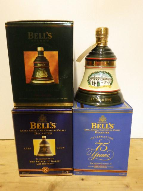 Four commemorative Bell's decanters Christmas 1989, Christmas 1993, Queen Elizabeth II 75 Years,