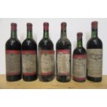 Three bottles 1945 Chateau Grand La Lagune, one bottle 1953, one bottle 1955, one half bottle 1953