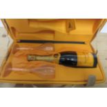 A Veuve Clicquot Traveller's Case containing one bottle NV Veuve Clicquot Ponsardin Brut Champagne