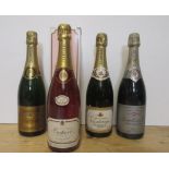 One bottle 1986 Lambert & Co Champagne, two bottles A. Carpenter Champagne, and one bottle Dudinot