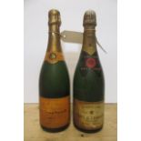 One bottle Moet & Chandon and one bottle Veuve Clicquot Ponsardin (both over 40 years old) (Est.