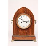 AN EDWARDIAN ROSEWOOD CASED TABLE CLOCK, the twin barrel movement striking on a gong, 4 1/4"