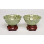 A PAIR OF TURNED AND POLISHED JADE BOWLS of plain circular form, 3 3/4" diameter, 1 1/2" high,