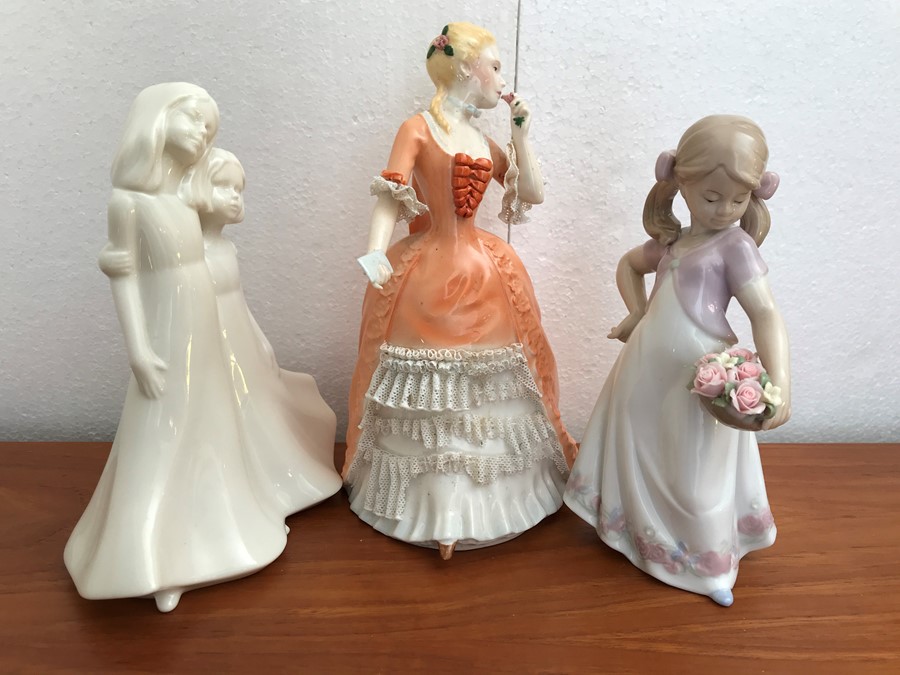 Three figurines including Royal Worcester