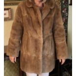Vintage fur coat , approx size 12, slight damage to lining.
