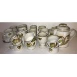 A quantity of vintage green flower pattern Denby tea ware. 6x cups and saucers, teapot, jug, 6x