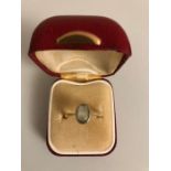 Aquamarine ring set in 18ct yellow gold, size P.