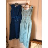 Two 1960's evening dresses, one labelled Blanes, size 20, good condition apart from some marks to