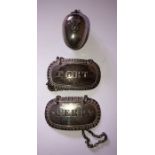 A pair of silver decanter labels, Rebecca Emes and Edward Barnard I, London 1824 and thimble