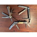 Three vintage multi function penknives