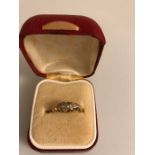 Diamond set ring in 18 carat gold mount, size K/L.