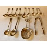 Thirteen various silver spoons and tongs. 4.1ozt.