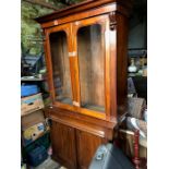 A 19thC mahogany bookcase, 2 glass doors with 2 door cupboard and drawer to base.