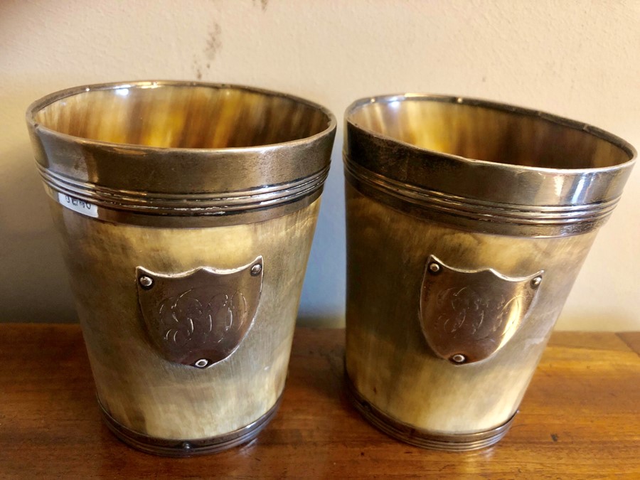 Two horn and silver mounted beakers. 10cms h, probably 1829.