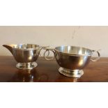 A silver jug and bowl. 9.8ozt