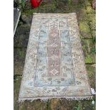 Turkish hand knotted rug faded