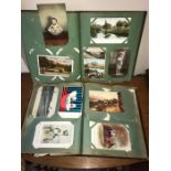 Two early 20thC postcard albums and contents.