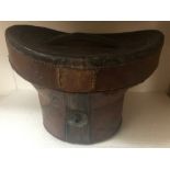 Top hat in original fitted leather case. Some wear to box and hat.