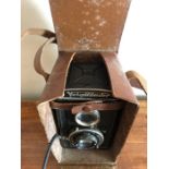 A leather cased vintage Voightlander camera.