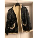 A vintage Chinese silk jacket with contrasting faux fur, repair needed to hem in places.