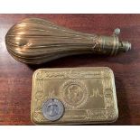 A 19th c copper powder flask, 1914 ration tin and a Relief of Mafeking medal