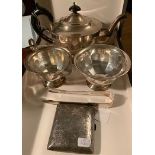 Three piece silver tea service with silver tongs and cigarette case 26.5 ozt