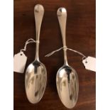 A pair of George II silver table spoons, Ebenezer Cocker, 1745/7, 5 ozt.