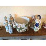 A selection of continental ceramics including large bowl and six figures, minor chips to some.