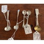 Five various condiment spoons