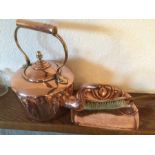 A Georgian copper kettle with acorn knob and an arts and crafts copper crumb tray and brush.