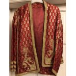 Oriental red jacket embroidered in gold thread work in good condition.