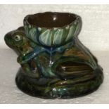 Brannam pottery vase in the form of a frog. Impressed marks 1898. 7cms h. Chips to base and around