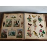 A 19thC scrap album and contents.