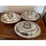 Three silver plated lidded tureens with locking handles