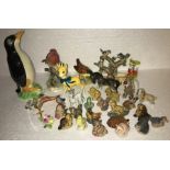 A selection of Decorative animal ceramics and glass comprising wade, Wymsies, Beswick, Adderley,