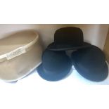 Three bowler hats and hat box, 2 vintage, 1 modern.