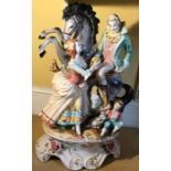 A large Capodimonte figurine in good condition. 60cms h.