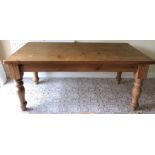 A good quality pine dining table, 184 l x 89 cms w.